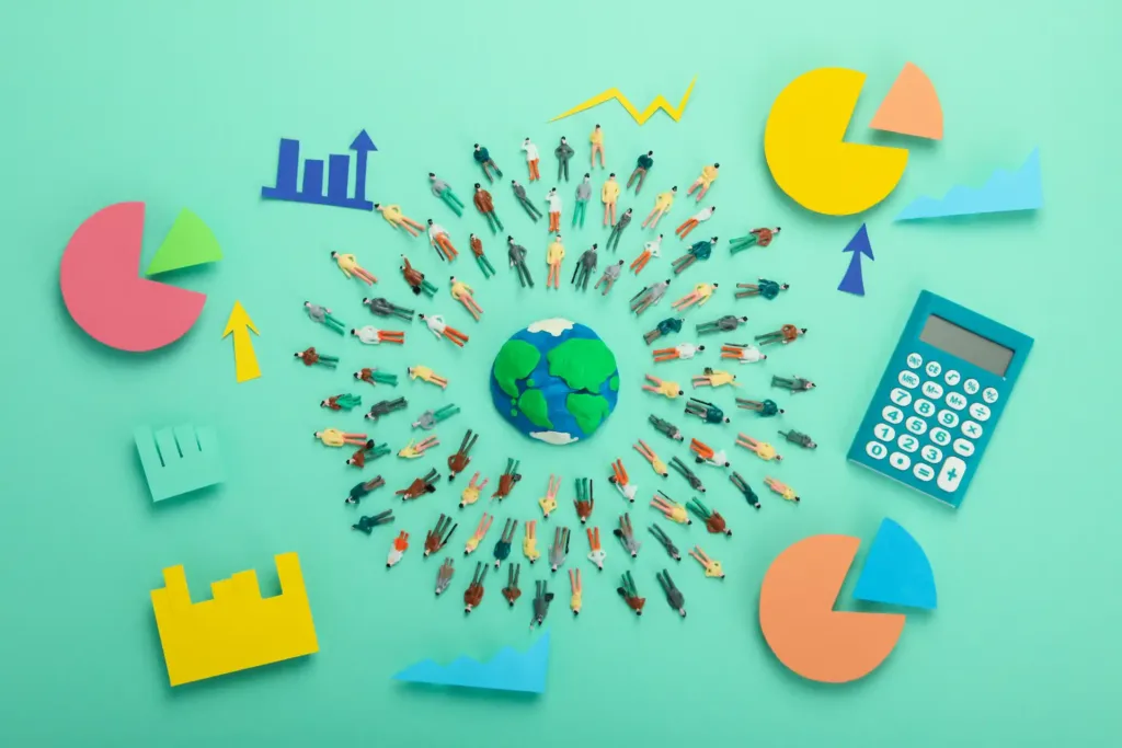 משרד פרסום דיגיטלי: המחשת פעולות של משרד פרסום דיגיטלי על ידי קריקטורת גלובוס, מסביבו המון דמויות אנשים, ומסביבם מחשבון וצ'ארטים מחולקים צבעוניים.